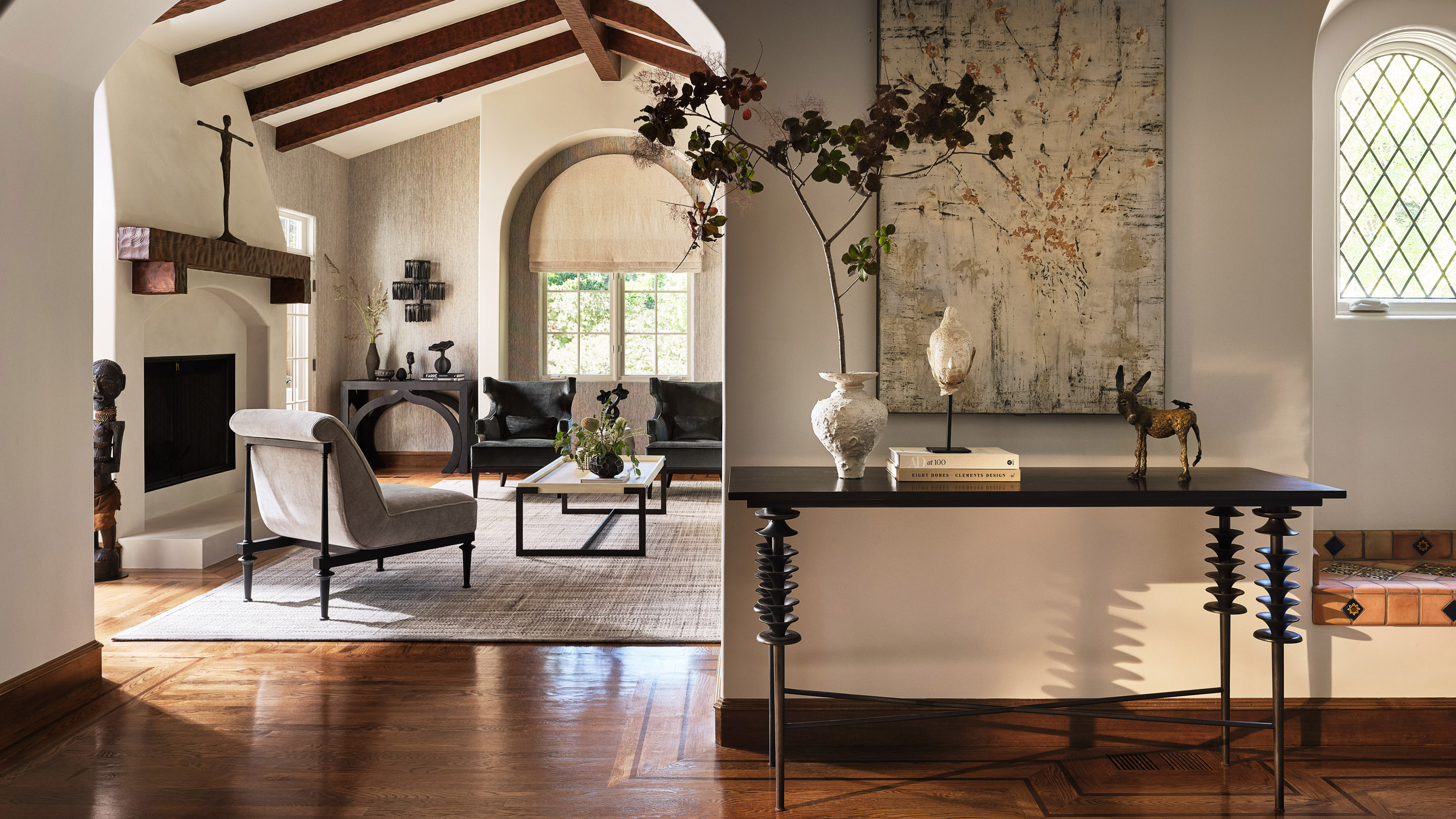 entryway with console against a white wall