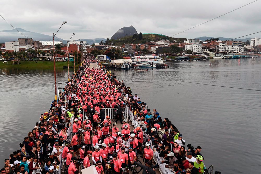 Clad in pink, riders in the Giro de Rigo get ready to start