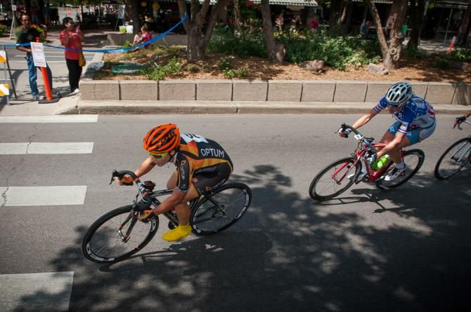 Brianna Walle, Optum, with National Criterium Champion Allison Powers, NOW, on her wheel during the opening laps of the race.