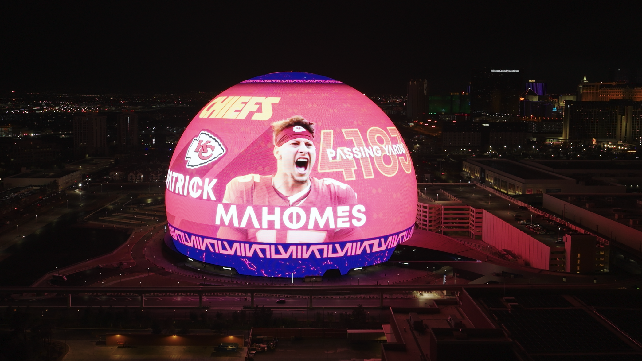 An image of Patrick Mahomes screaming with his stats are projected onto the Vegas Sphere.