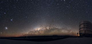 The Large Magellanic Cloud and Small Magellanic Cloud are visible to the left of the Milky Way in this photo taken from the European Southern Observatory's facilities in northern Chile.