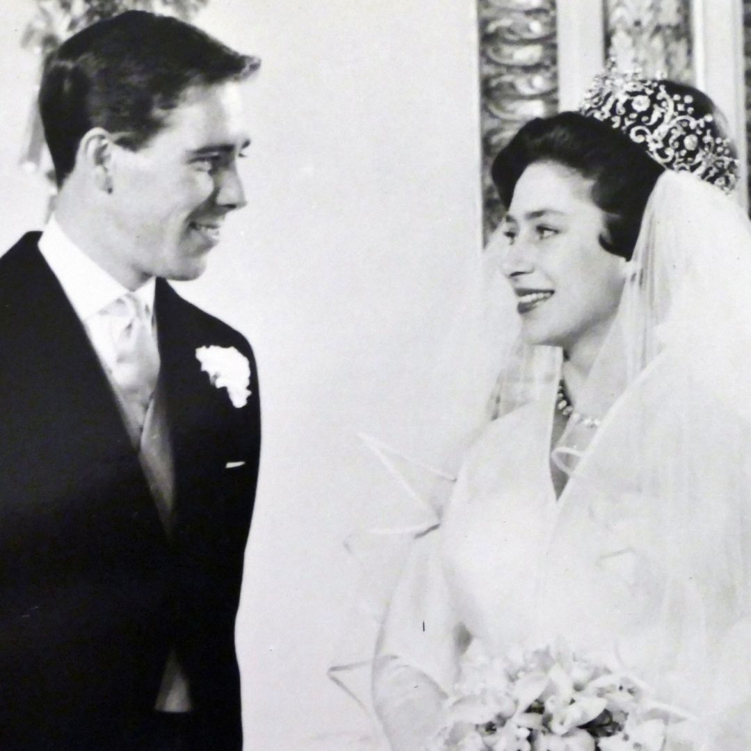 Anthony Armstrong Jones and Princess Margaret smiling at each other on their wedding day