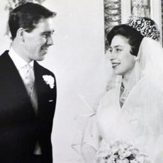 Anthony Armstrong Jones and Princess Margaret smiling at each other on their wedding day