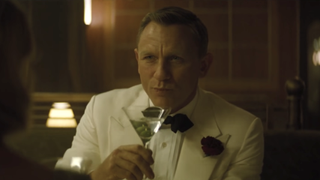 Daniel Craig sipping a martini