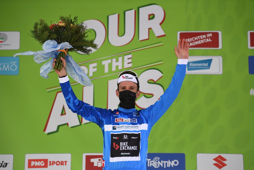 FEICHTEN IM KAUNERTAL AUSTRIA APRIL 20 Simon Yates of United Kingdom and Team BikeExchange Blue Mountain Jersey celebrates at podium during the 44th Tour of the Alps 2021 Stage 2 a 1215km stage from Innsbruck to Feichten im Kaunertal 1291m Mask Covid Safety Measures TourofTheAlps TouroftheAlps on April 20 2021 in Feichten im Kaunertal Austria Photo by Tim de WaeleGetty Images