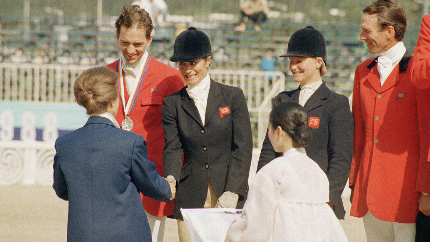 Britain s Princess Anne, far left, congratulates Britain s equestrian silver medal team of (left to right) Ian Stark, Virginia Leng, Karen Straker and Captain Mark Phillips during the awards ceremony for the Olympic team Jumping Test in Seoul on Sept. 2