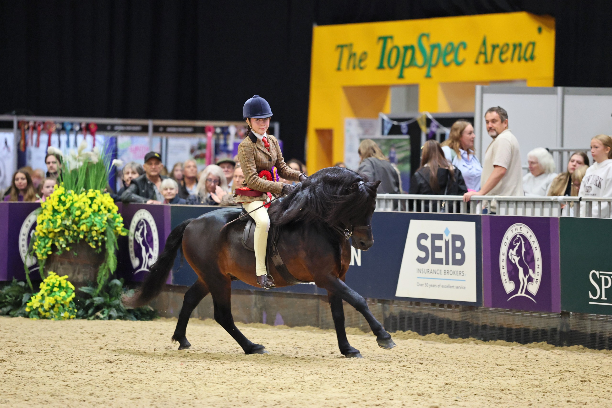 Salcombe Frowder Cove and Maisie Kerry-Oates on their lap of honour
