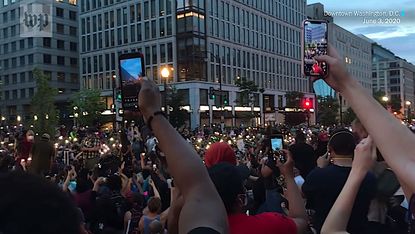 Song amid protest in Washington, D.C.