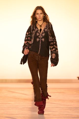 model wearing boho clothing on isabel marant spring 2025 runway