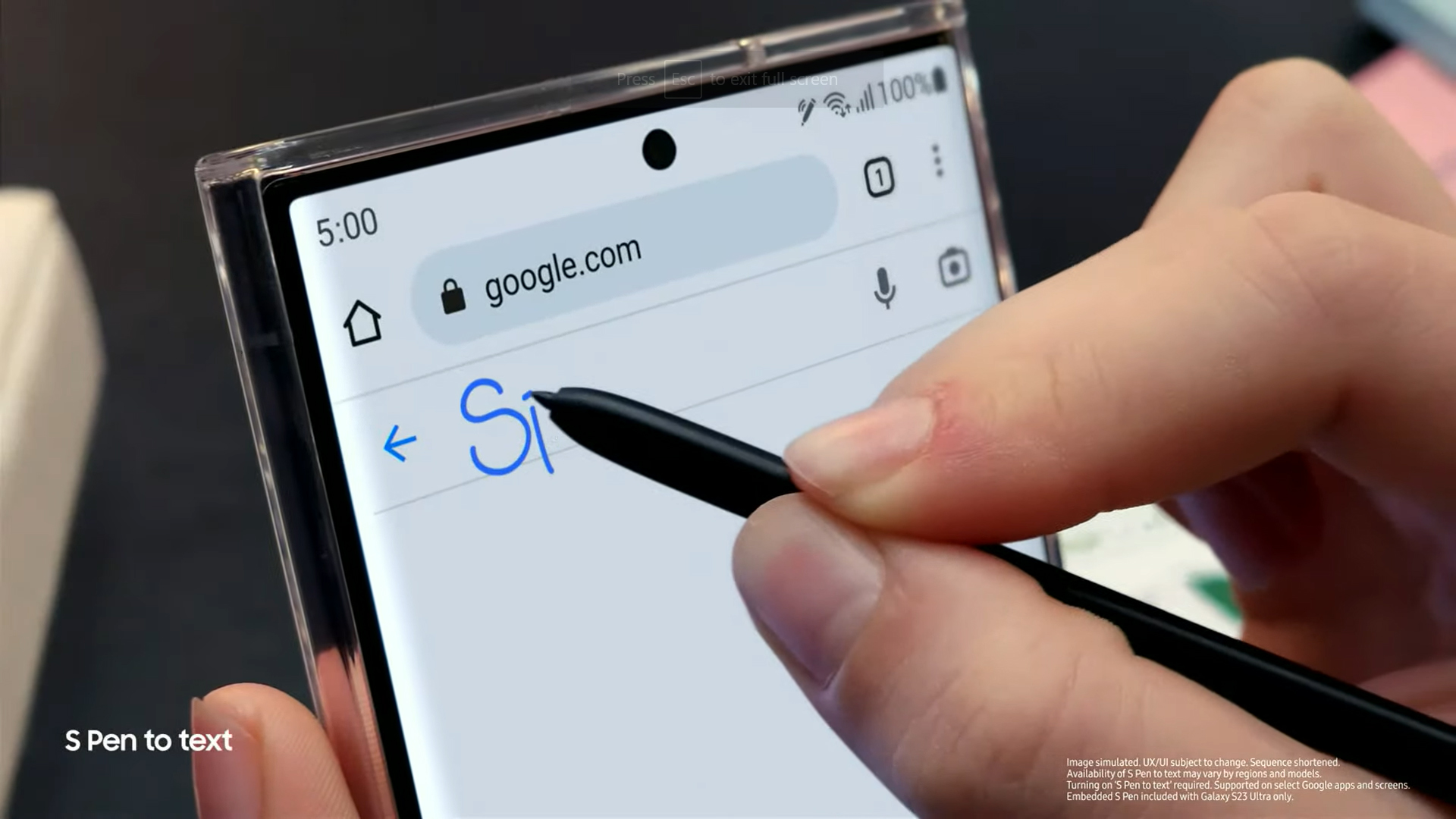 A hand holding the Samsung S Pen