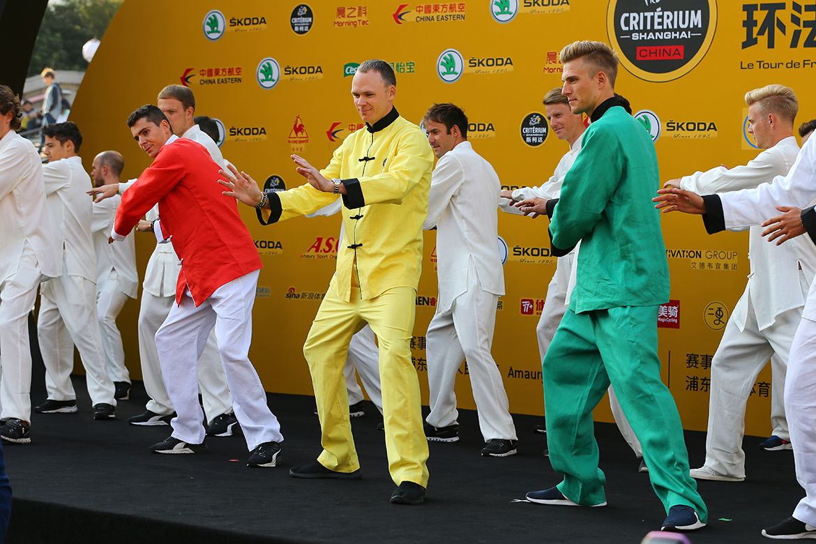The riders have a go at Tai Chi on stage