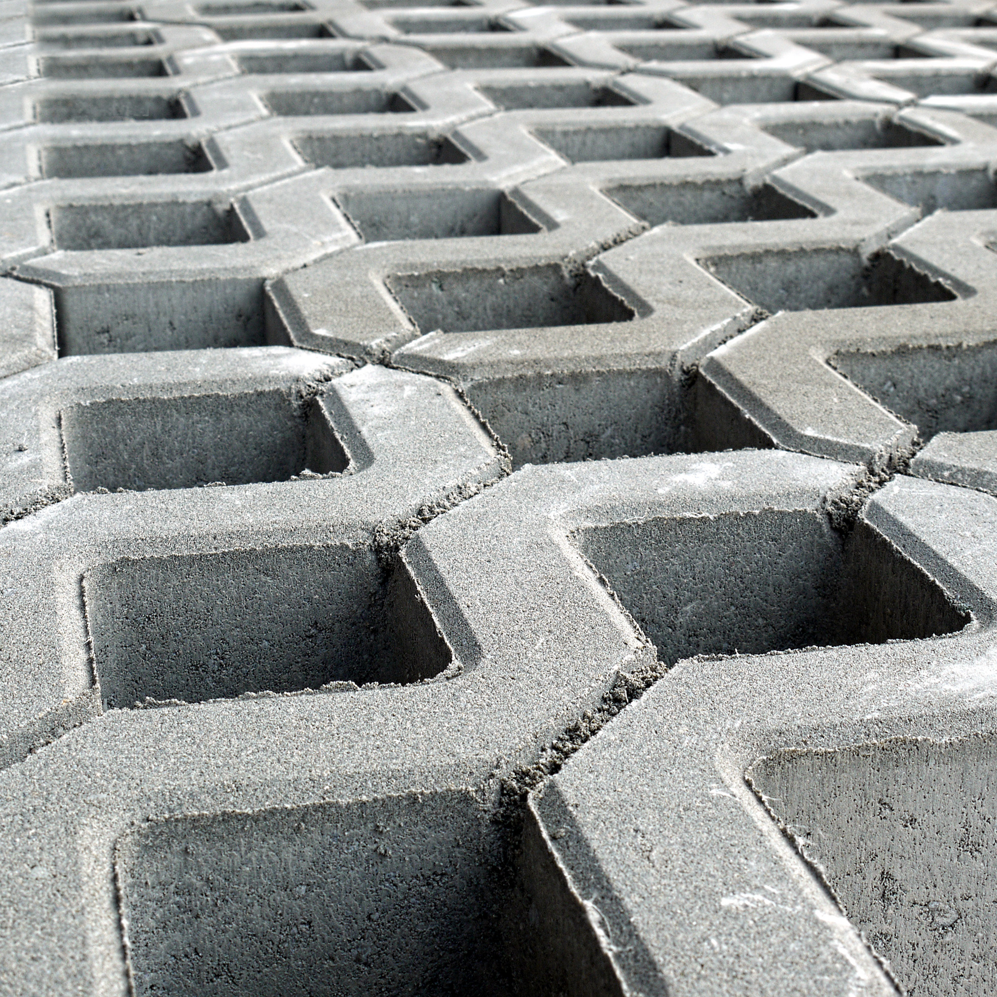 Closeup of openwork concrete pavement