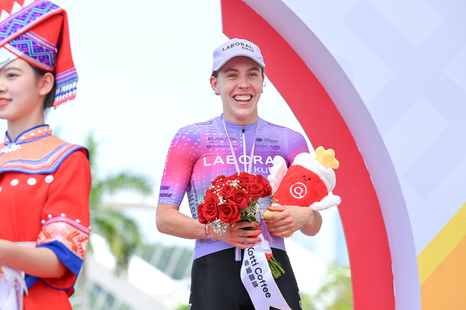 Usoa Ostolaza celebrates on the final podium of the 2025 Tour of Guangxi