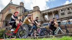 Cyclists in front of Alexandra Palace
