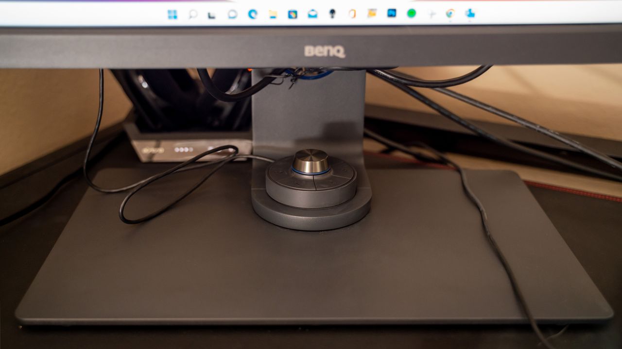 A close up image of the BenQ SW321C hotkey puck
