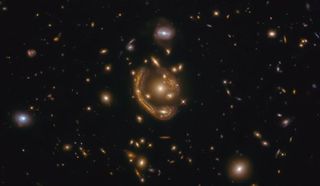 A Hubble Space Telescope image shows one of the most complete Einstein ring scientists have studied to date.