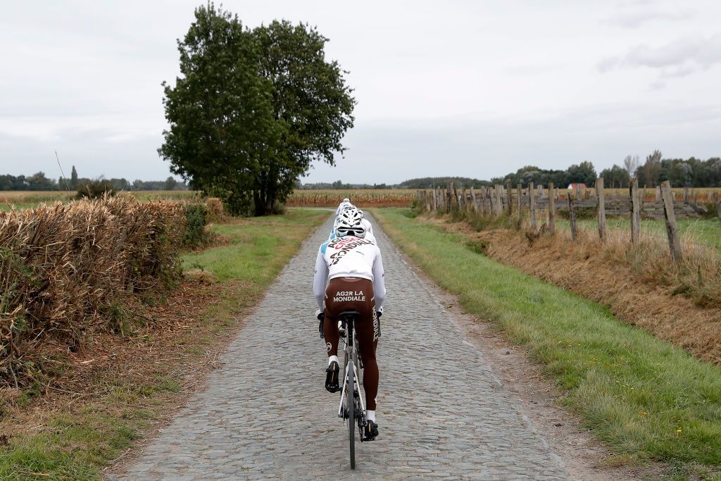 ARENBERG FRANCE SEPTEMBER 30 AG2R Citren Team rider in a cobblestones sector during the 118th Paris Roubaix 2021 Training Day 1 ParisRoubaix on September 30 2021 in Arenberg France Photo by Bas CzerwinskiGetty Images
