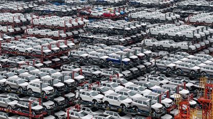 Thousands of electric vehicles, viewed from above.