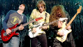 Joe Satriani, Steve Vai, and Yngvie Malmsteen perform, Chicago, Illinois, October 24, 2003. 