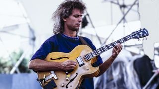 Pat Metheny performs onstage with his 1958 Gibson ES-175 in 1990. 