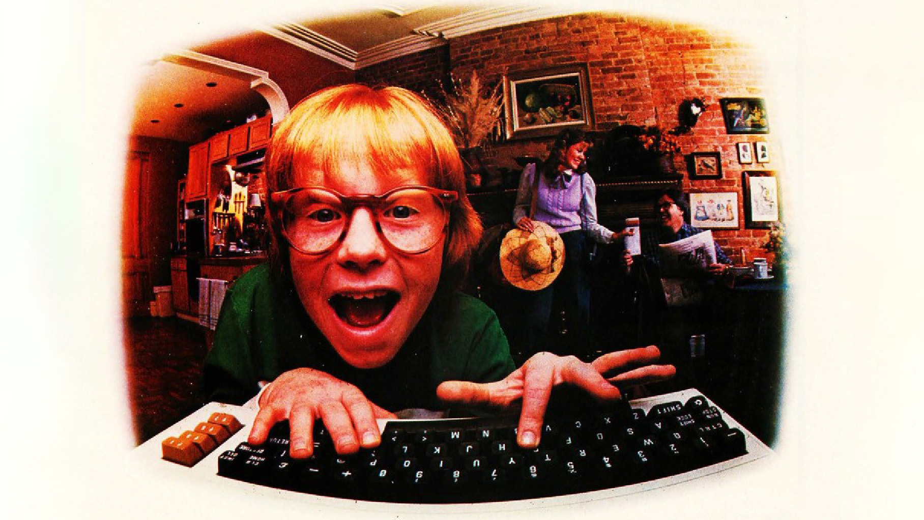 Compuserve ad of a kid looking into the computer screen