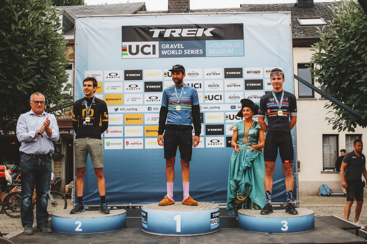 The podium of the Houffa Gravel race in Belgium, with Jasper Ockeloen first, Seppe Rombouts second and Hendrik Kruger third. Part of the 2022 UCI Gravel World Series