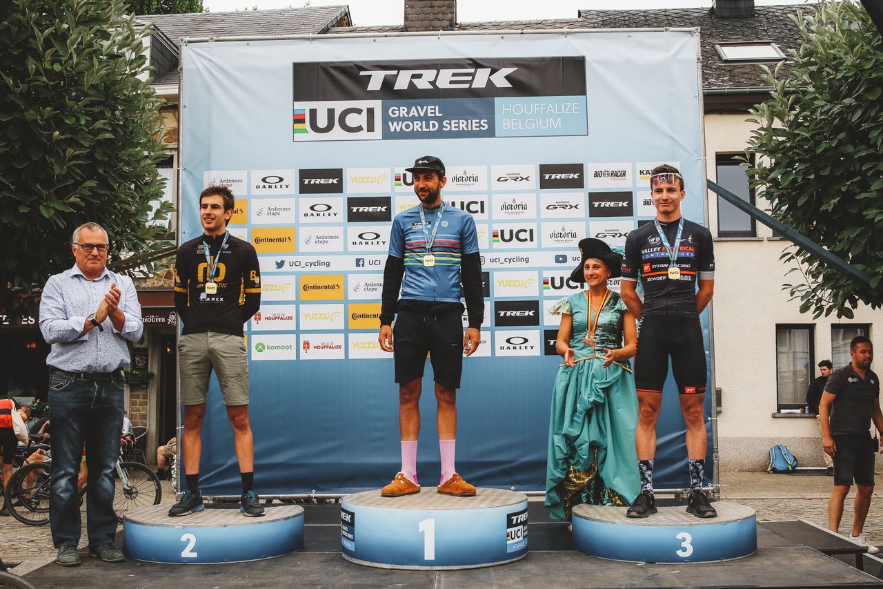 The podium of the Houffa Gravel race in Belgium, with Jasper Ockeloen first, Seppe Rombouts second and Hendrik Kruger third. Part of the 2022 UCI Gravel World Series