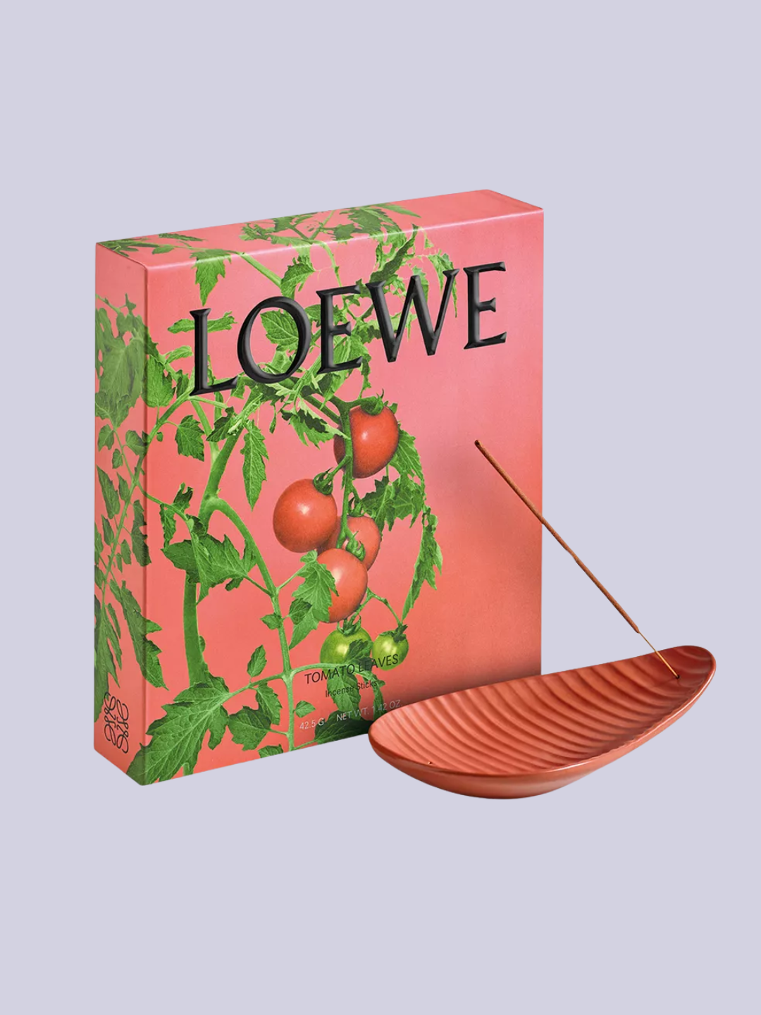 A set of tomato leaf incense sticks and a textured holder from Loewe