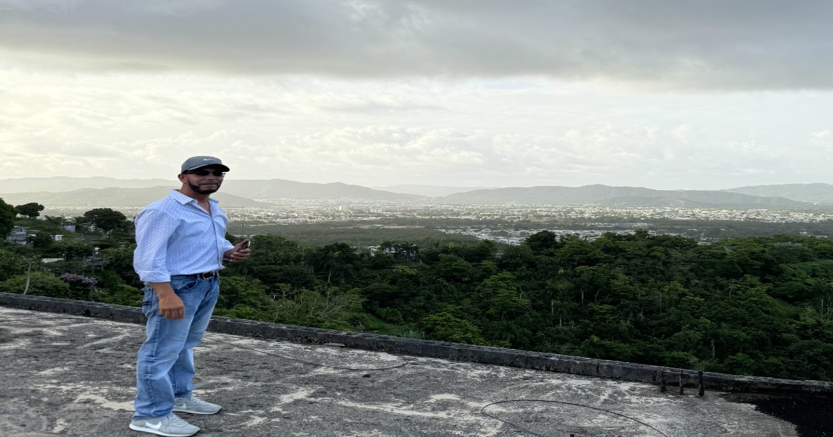 Eric Rivera on the roof of his home in Puerto Rico.