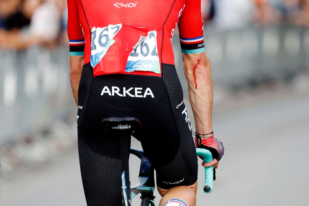 PEER BELGIUM AUGUST 26 Arnaud Dmare of France And Team ArkaSamsic crosses the finish line injured after being involved in a crash during the 19th Renewi Tour 2023 Stage 4 a 1794km stage from Beringen to Peer UCIWT on August 26 2023 in Peer Belgium Photo by Bas CzerwinskiGetty Images