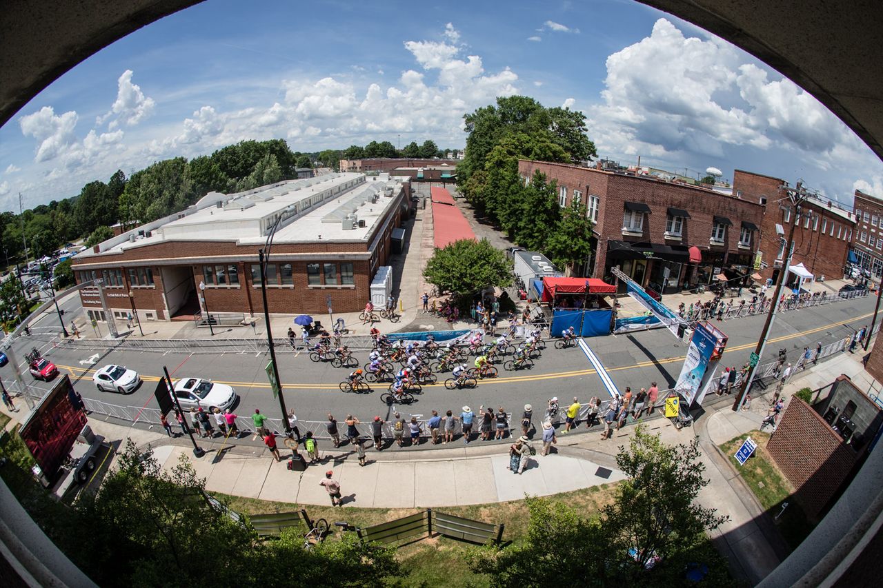 The womens peloton heads back through downtown.