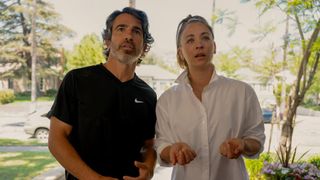 Chris Messina as Nathan and Kaley Cuoco as Ava, both shocked in Based on a True Story season 2