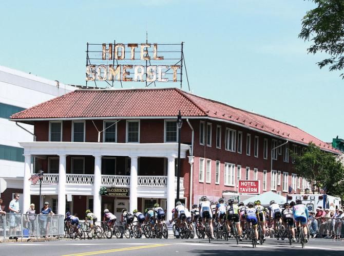Hotel Somerset, the host of many races, enjoys the glorious Memorial Day weather, as the riders fly by