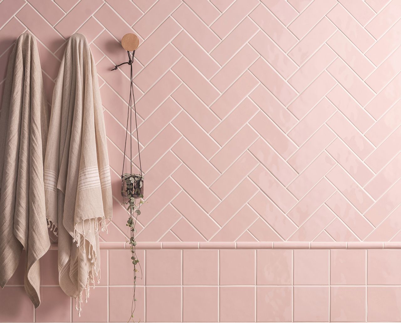 pink herringbone subway tiles in bathroom