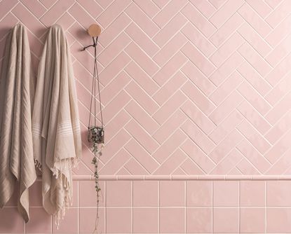 pink herringbone subway tiles in bathroom 