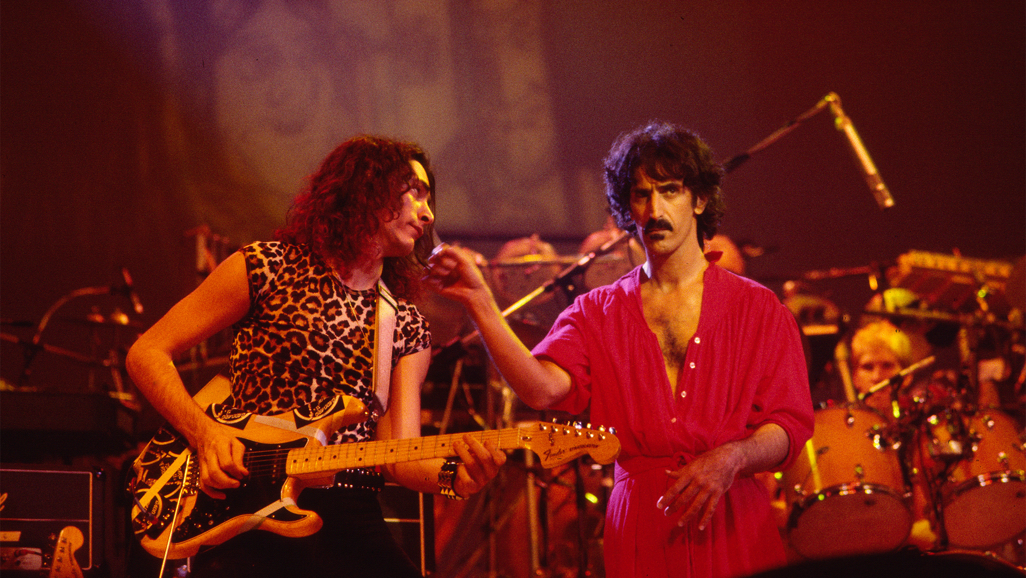 American musicians Steve Vai (left), on guitar, and Frank Zappa (1940 - 1993) perform on stage at the Palladium, New York, New York, October 31, 1981.