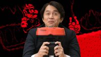 holding Switch Virtual Boy with Wario Land in backdrop.