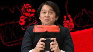 holding Switch Virtual Boy with Wario Land in backdrop.
