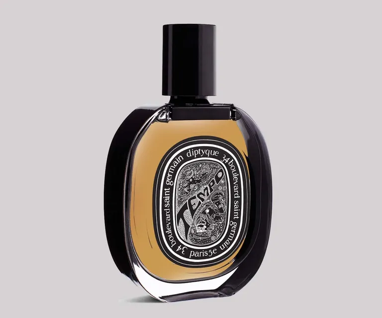 Diptyque Tempo perfume in round glass bottle with black cap and label