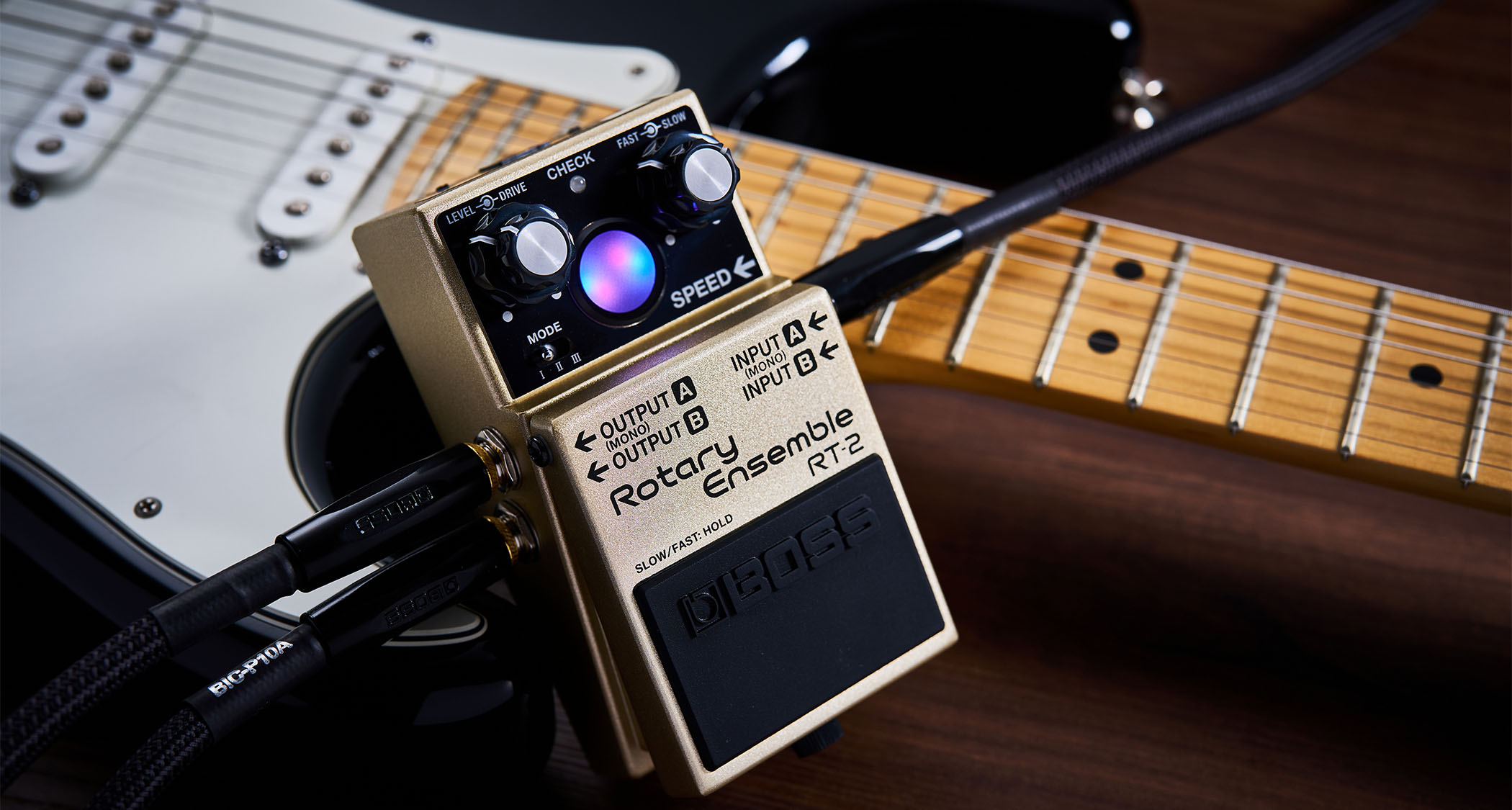Boss RT-2 Rotary Ensemble: the rotating speaker emulator has a visual reference on front, three modes, mono/stereo outputs and a metallic gold paintjob.