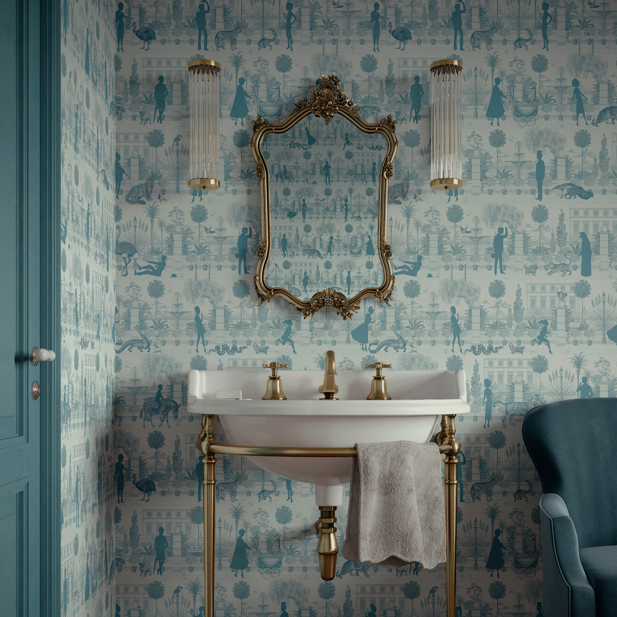 A blue patterned wallpapered bathroom with white basin and brass hardware