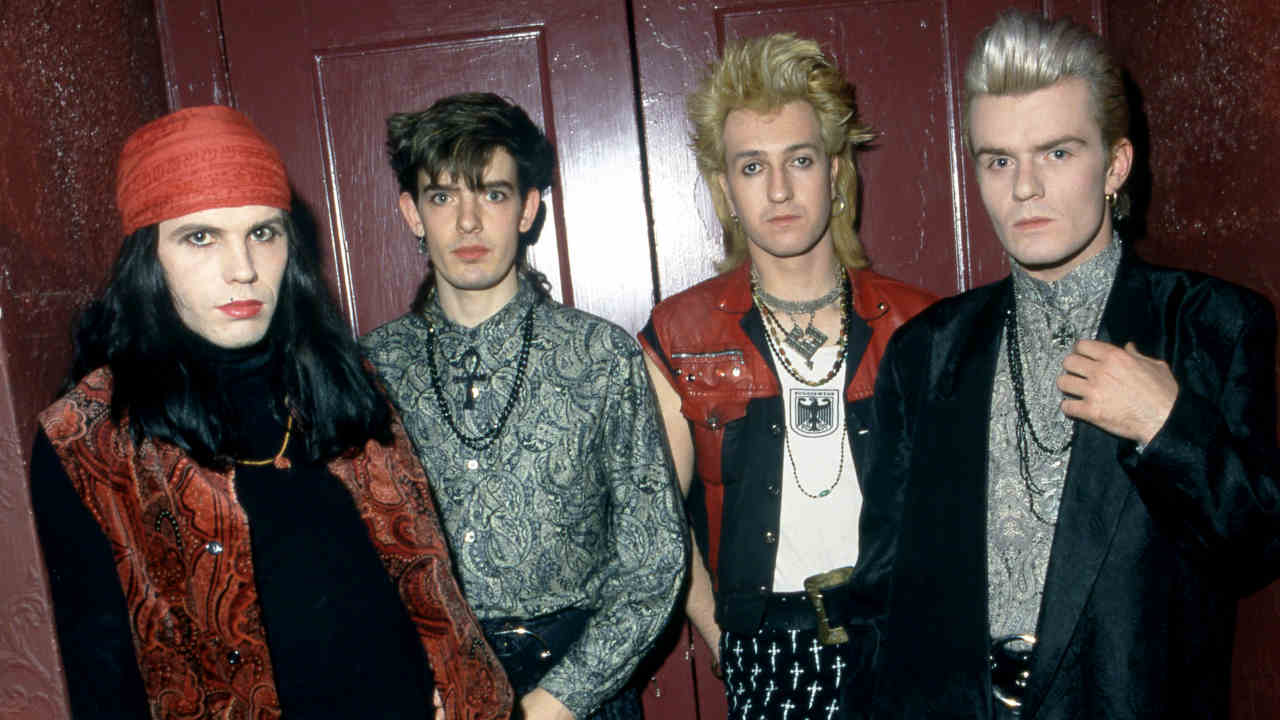 The Cult posing for a photograph in 1985