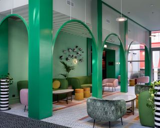 green arches in hotel lobby