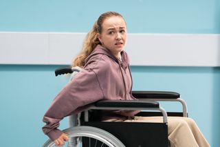 Amy Mitchell in a wheelchair