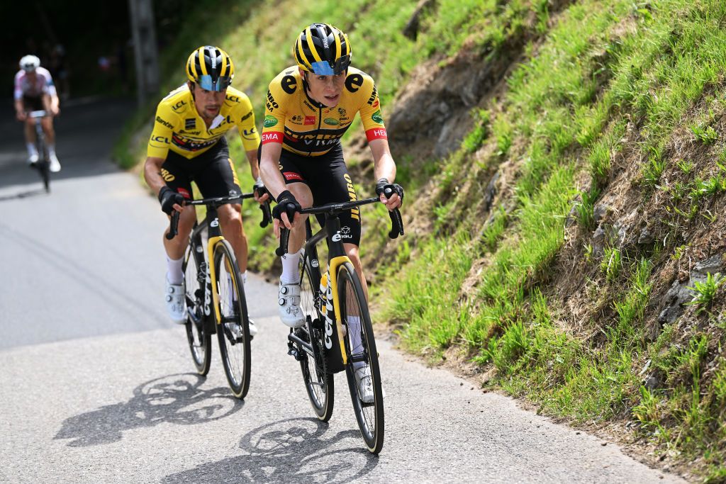 PLATEAU DE SALAISON FRANCE JUNE 12 LR Primoz Roglic of Slovenia Yellow Leader Jersey and Jonas Vingegaard Rasmussen of Denmark and Team Jumbo Visma attack during the 74th Criterium du Dauphine 2022 Stage 8 a 1388km stage from SaintAlbanLeysse to Plateau de Salaison 1495m WorldTour Dauphin on June 12 2022 in Plateau de Salaison France Photo by Dario BelingheriGetty Images