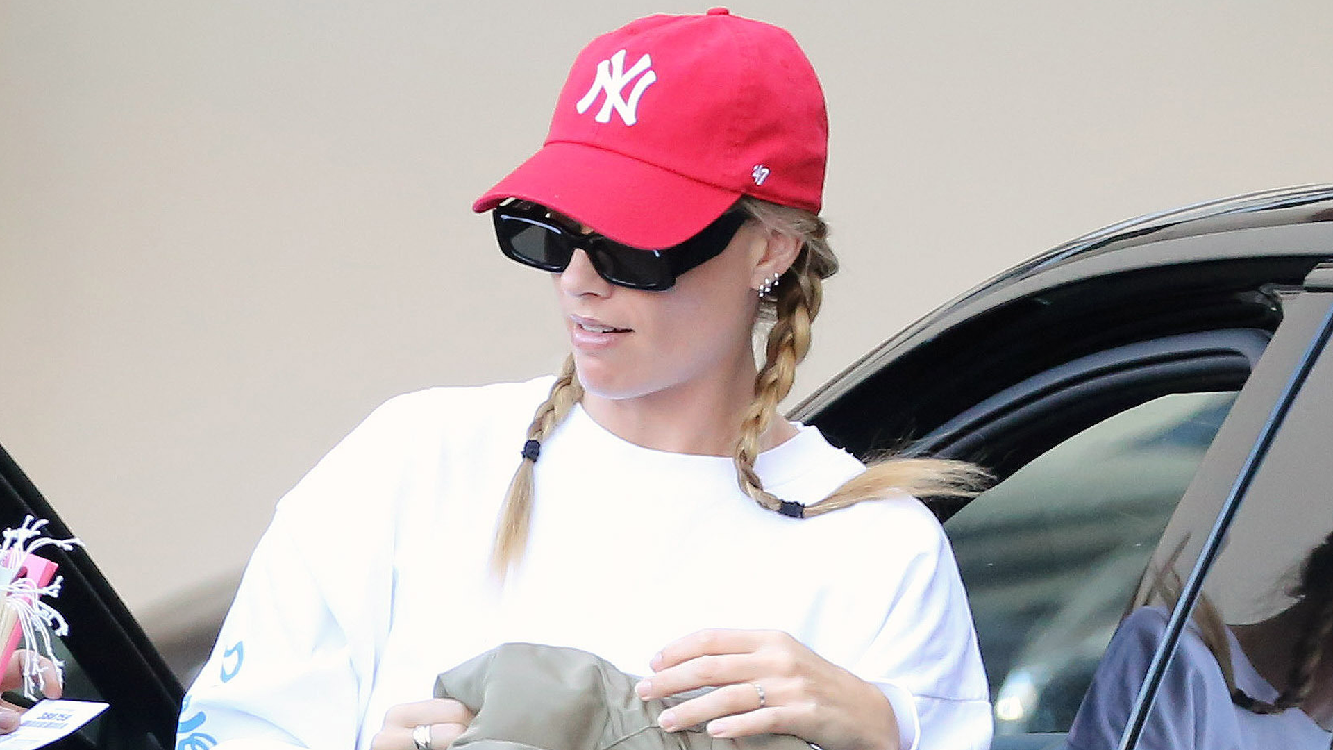 Margot Robbie was spotted in L.A. wearing black leggings and Loewe ballet sneakers