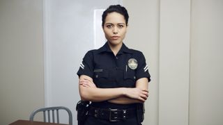 Alyssa Diaz as Angela Lopez in uniform in The Rookie