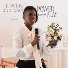 Nikki Ogunnaike gives a speech at a Cle de Peau Marie Claire luncheon