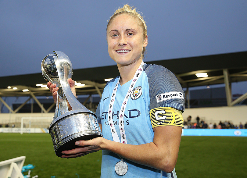 Steph Houghton holding a trophy