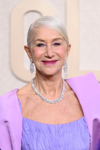 Helen Mirren has a sleek updo at the 81st Golden Globe Awards held at the Beverly Hilton Hotel on January 7, 2024 in Beverly Hills, California.